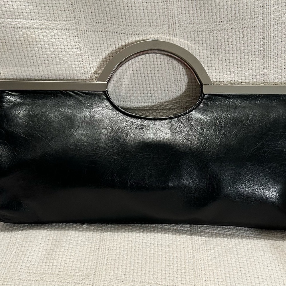 Sleek Black Leather Wristlet Clutch with Silver Metal Handle